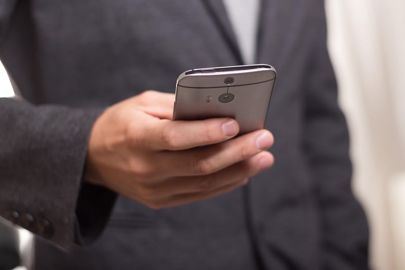 Business Woman Using Smartphone